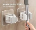 Samoprzylepny-Uchwyt-Wieszak-Organizer-Na-Miotly-Grabie-I-Narzedzia-Bialy-EAN-GTIN-5906349984931.jpg